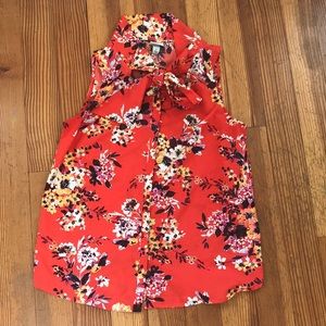 Red floral tie-neck sleeveless blouse